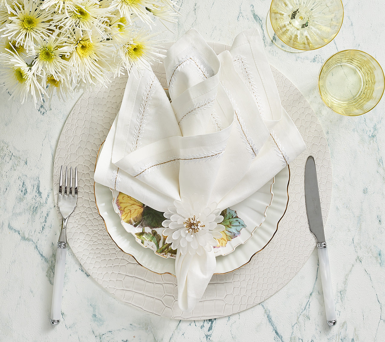 Cosmos Napkin Ring in White & Gold by Kim Seybert